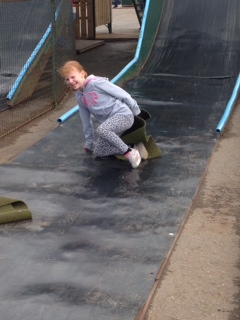 Braving the slide for the first time